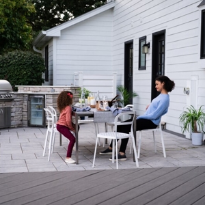 Outdoor patio with mom and daughter